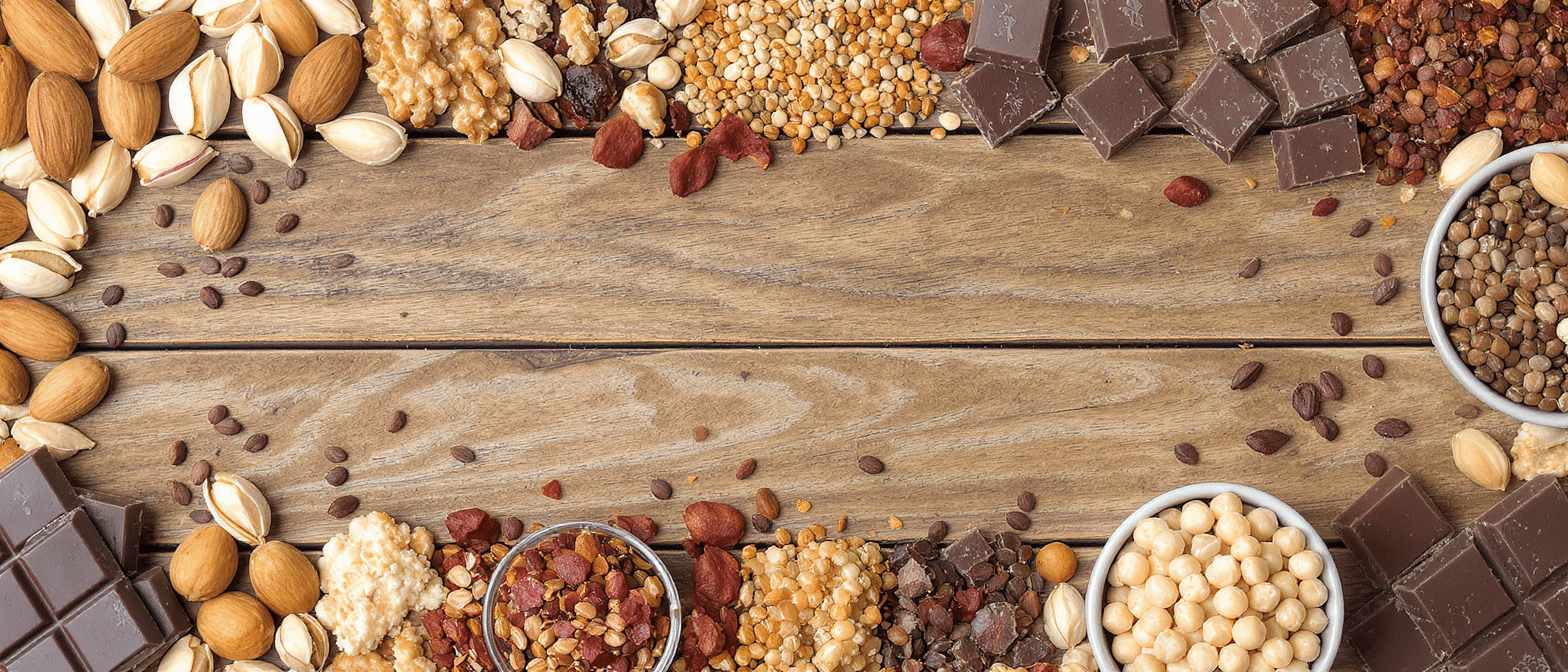 aliments-riches-en-magnesium-nootralis Sélection d’aliments riches en magnésium tels que oléagineux, graines, légumineuses et chocolat.